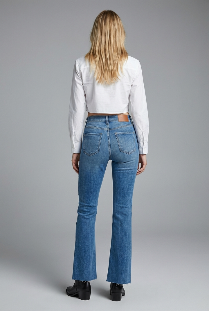 HIGH RISE CROSSOVER WAIST FLARE JEANS