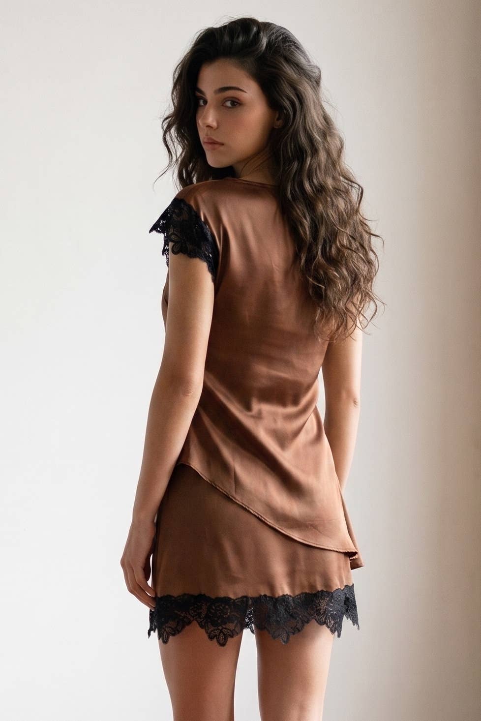 ASYMMETRIC TOP WITH LACE HEM